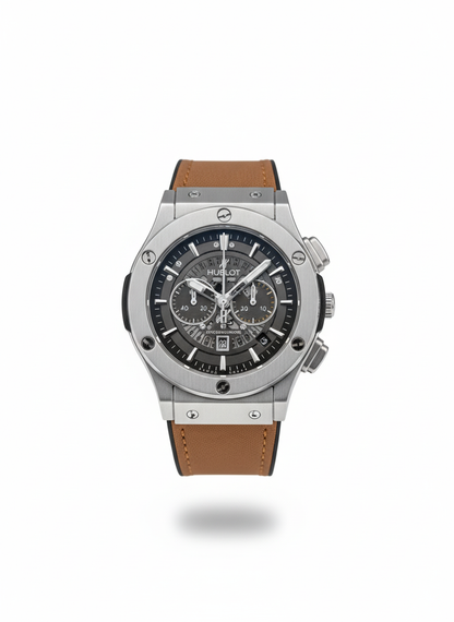 Hublot watch with brown leather strap on a white background