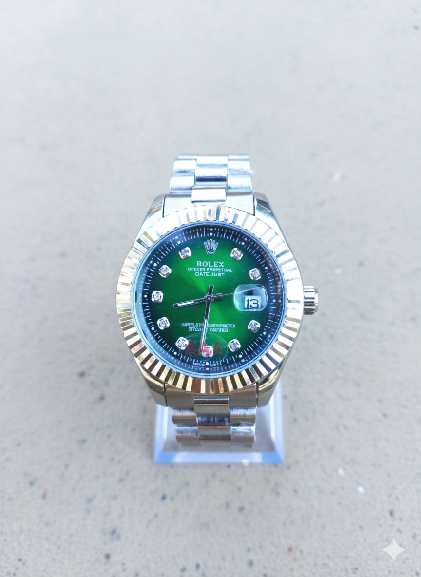 Rolex watch with green face and silver case on a light gray background